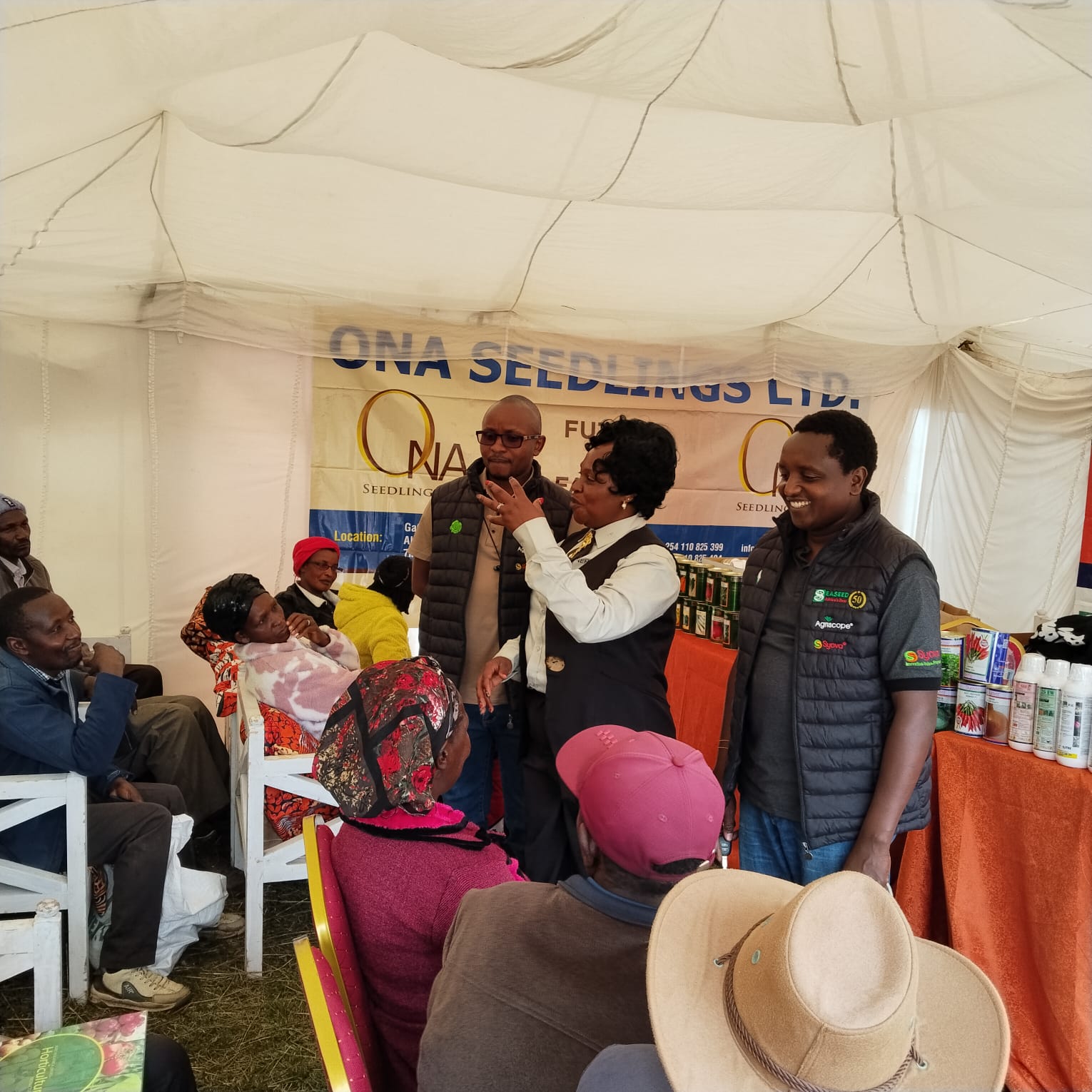 Nehema Agrovet team engaging with community members at agricultural event