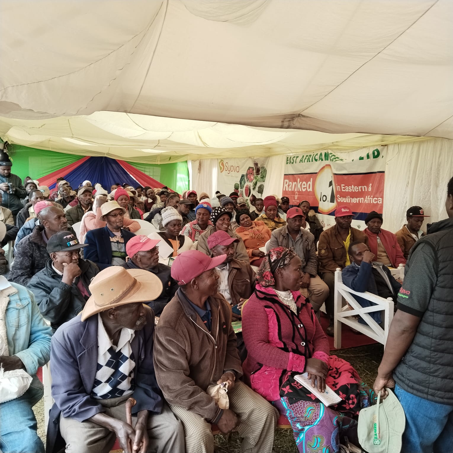 Large crowd of farmers attending an agricultural workshop